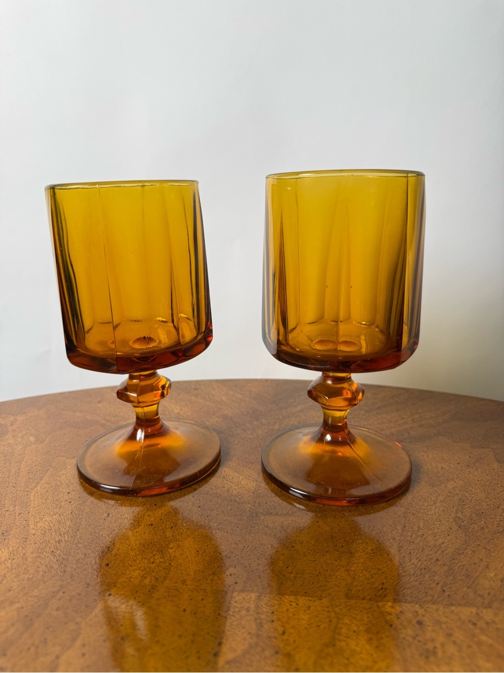 Vintage Pair of Mid-Century Nouveau by Colony Amber Glass Footed Goblets
